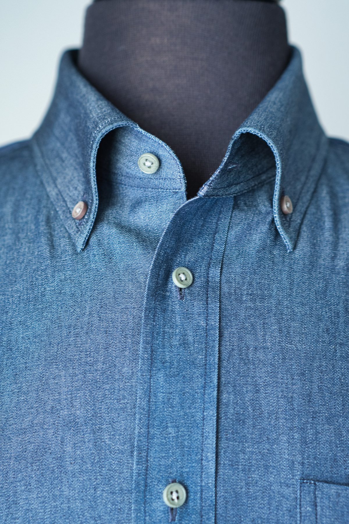 Button down chambray shirt collar on a dress form